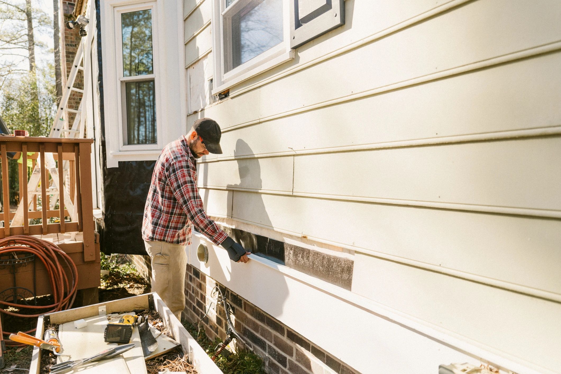 Technician performing professional home maintenance